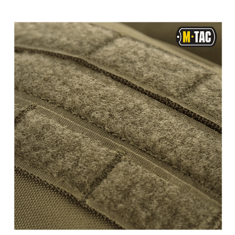 M-Tac Assault Pack with MOLLE system, close-up of durable materials and Velcro details. Backpack for city use or short trips.