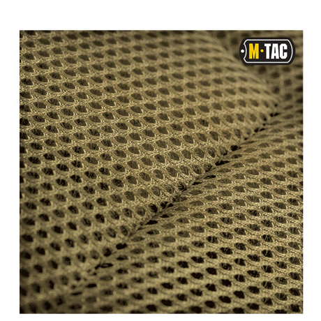 Close-up of M-Tac Assault Pack material with MOLLE system and mesh structure in brown