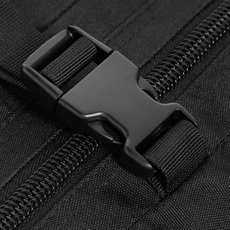 Close-up of zipper pull on M-Tac Assault Pack Laser Cut, sturdy fabric and buckles, the essence of durability and functionality.