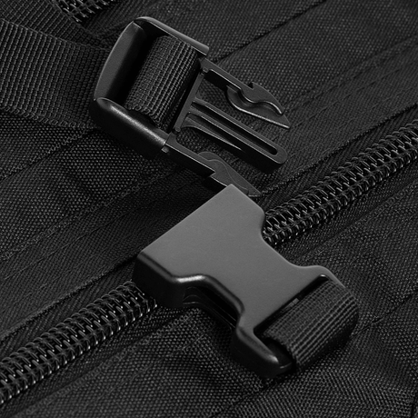 M-Tac Assault Pack Laser Cut buckle and zipper details in black polyester.