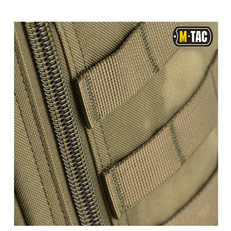 Close-up of M-Tac Large Assault Pack Backpack with MOLLE attachment system and zipper details