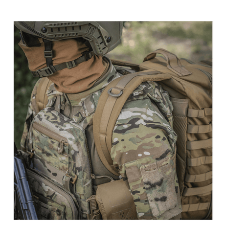 M-Tac Large Assault Pack Backpack with MOLLE system and padded shoulder straps seen on a person in camouflage gear