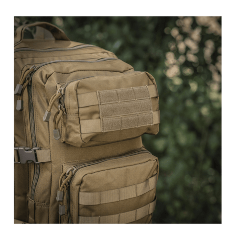 M-Tac Large Assault Pack Backpack in tactical design with MOLLE system and extra pockets, shown in a dense forest area