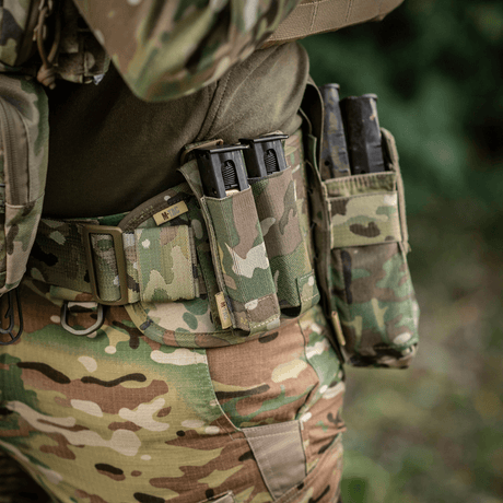 M-Tac Double Magazine Pouch APS Laser Cut in use with camouflage design for quick and secure transport of magazines in the field.