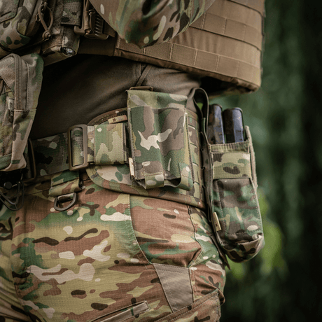 M-Tac Double Magazine Pouch APS Laser Cut attached to a tactical belt with camouflage design, showing robust Cordura material and MOLLE mounting.