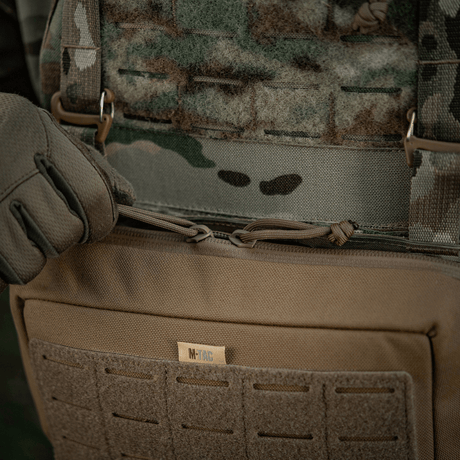 M-Tac Admin Pouch Large Elite mounted on a tactical vest in woodland camouflage, made from durable Cordura with pockets and zippers.