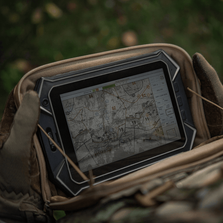M-Tac Admin Pouch Large Elite with a tablet showing a map, stored in the durable Cordura 500D pouch outdoors.