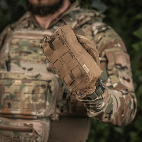 M-Tac Mediclomme Small Vertical Elite i solid multicam nylon med intern IFAK-organizer og NIJ-certificering vist i gallery position 1.