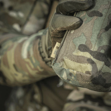 M-Tac Mediclomme Small Vertical Elite i slidstærkt multicam nylon med NIJ-certificering og integreret IFAK-organizer vist i gallery position 1.