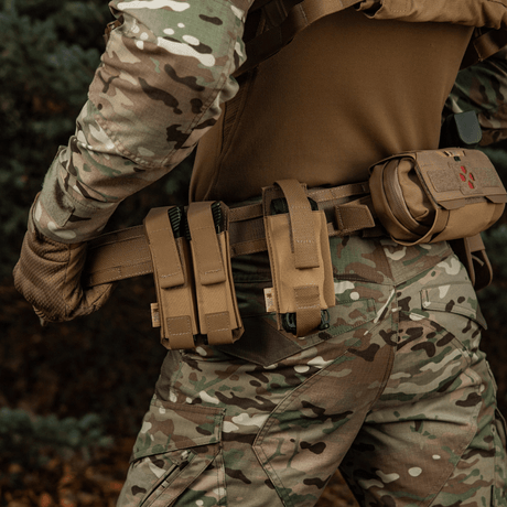 M-Tac Range Belt Cobra Buckle Gen.IV in use by tactical operator with camouflaged gear.
