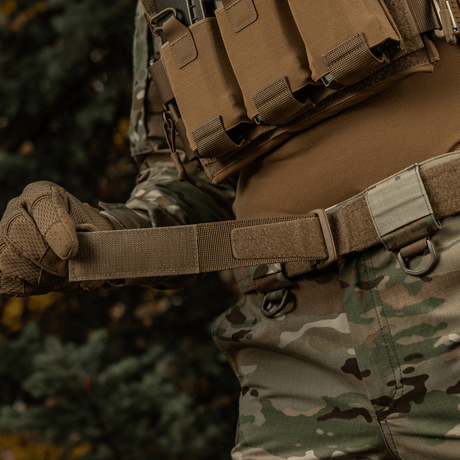 M-Tac Range Belt Cobra Buckle Gen.IV in use with military uniform, showing belt system with magazine holders and camouflage pattern.