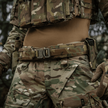 M-Tac Range Belt Cobra Buckle Gen.IV tactical belt in camouflage for military use, shown with gear attached to the belt.