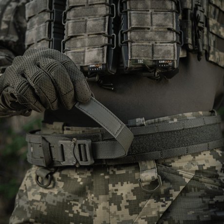 M-Tac Range Belt Cobra Buckle Gen.IV tactical belt in use. Ideal for military, police and shooting ranges with adjustable fit and Tegris reinforcement