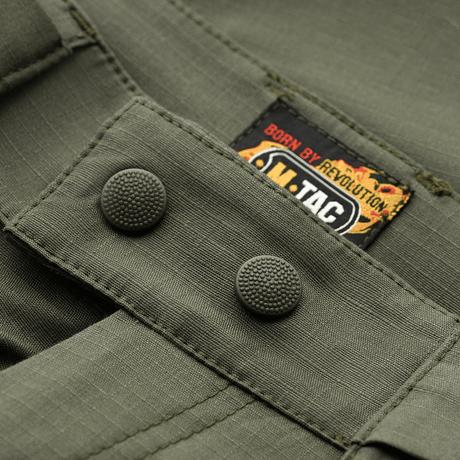 M-Tac Shorts Aggressor Gen.II Flex med holdbare dobbeltknapper og Teflon-belægning i robust rip-stop materiale, tæt på syning.