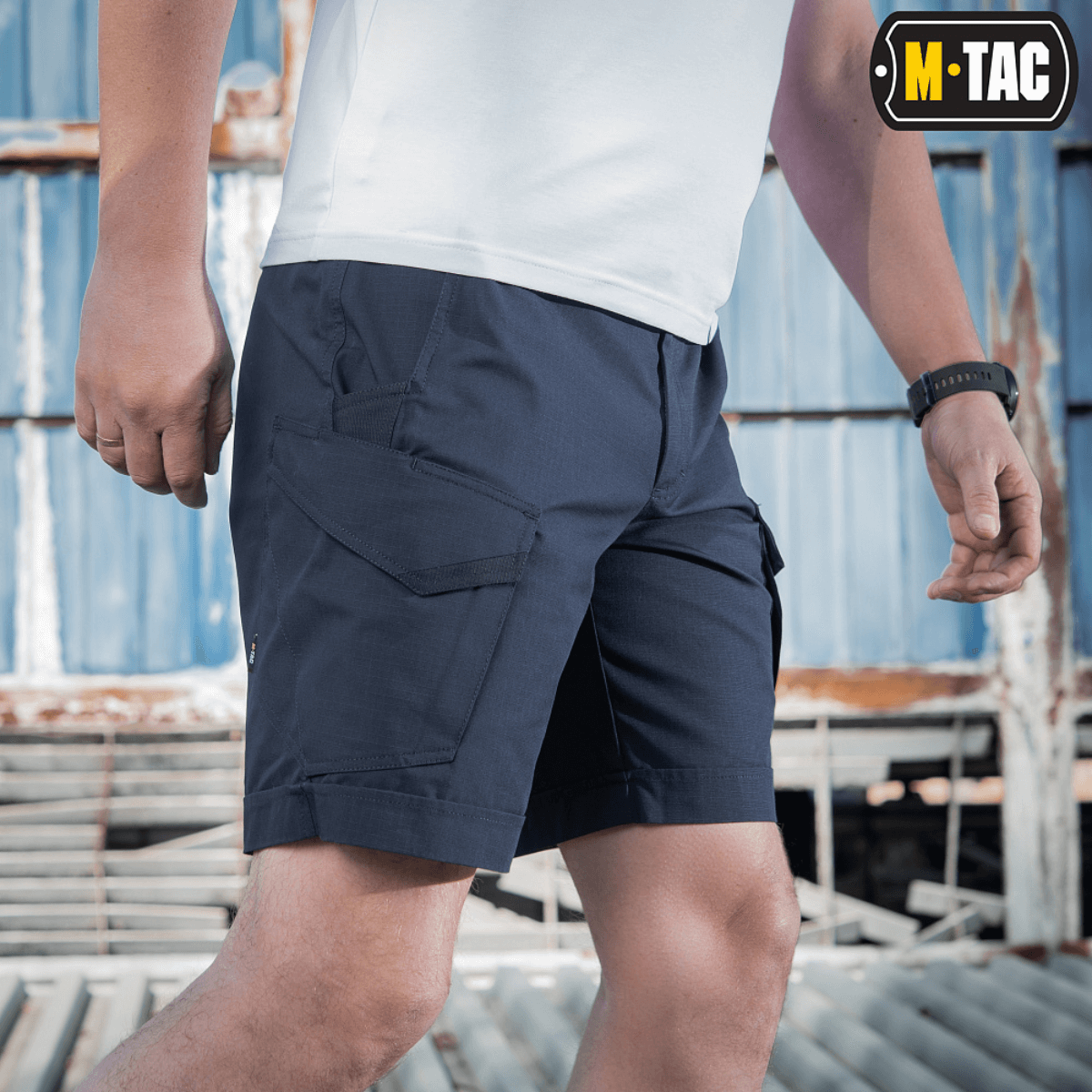 M-Tac Shorts Aggressor Short i navy, knælange vandreturshorts i polycotton flex rip-stop med taktiske funktioner og justerbare bæltestropper.