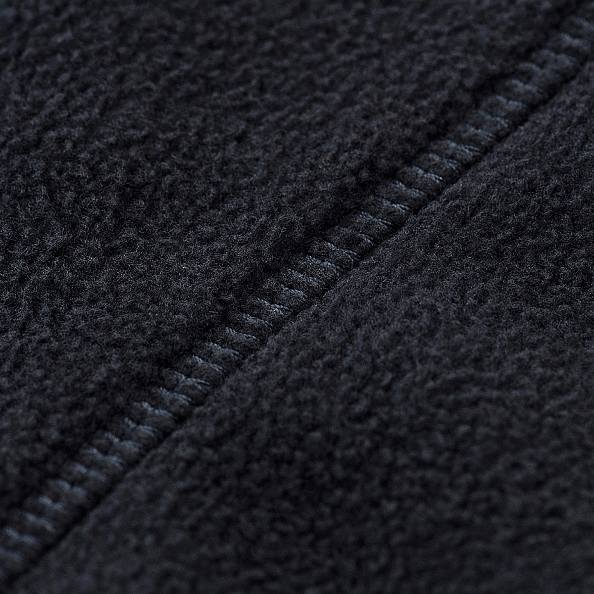 Nærbillede af M-Tac Lite Microfleece Hættetrøje med tynd, elastisk mikrofleece tekstur.