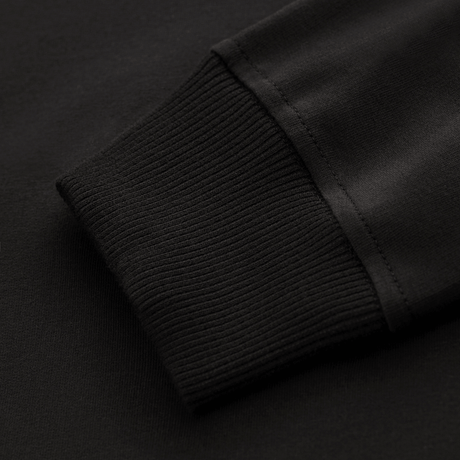 Close-up of M-Tac Pullover 4 Seasons with stretch cuff and 95% cotton; minimalist black design for year-round use