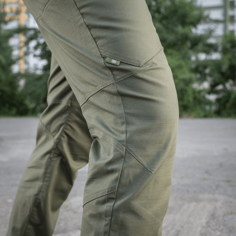 M-Tac Tactical Bukser Patrol Gen II Flex i grøn, ideel til outdoor aktiviteter. Taktiske detaljer for komfort og funktionalitet.
