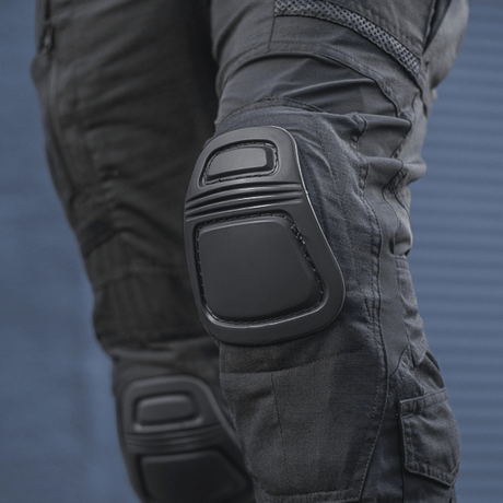 M-Tac Bukser Army NYCO Extreme i sort med holdbar nylon-bomuld, NIJ-certificeret og integrerede knæbeskyttere, gallery position 1 tæt på knædetail.