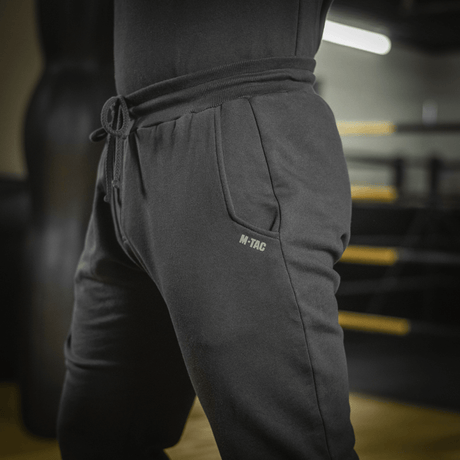 M-Tac Cotton Classic sports pants for running and fitness with elastic waist and side pockets, ideal for activity and everyday use.