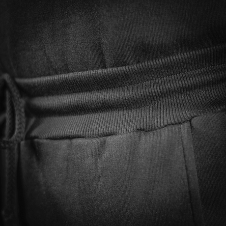 M-Tac Cotton Classic pants in black, comfortable elastic waist, 100% cotton, ideal for sport and everyday wear, detail of waist and drawcord.