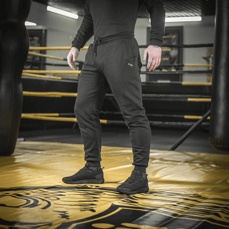 M-Tac Cotton Classic pants in a training environment, versatile sports pants for running and fitness, 100% cotton for comfort and breathability.