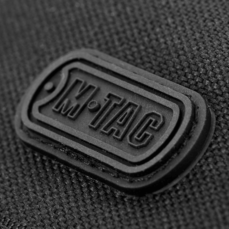 Close-up of M-Tac logo on M-Tac Pung Elite, made from durable Cordura nylon, military-style design.
