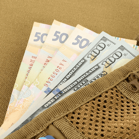 Currency in an M-Tac Pung Elite Gen.II with Cordura 500D and YKK zippers, showing durability and functionality for storage.