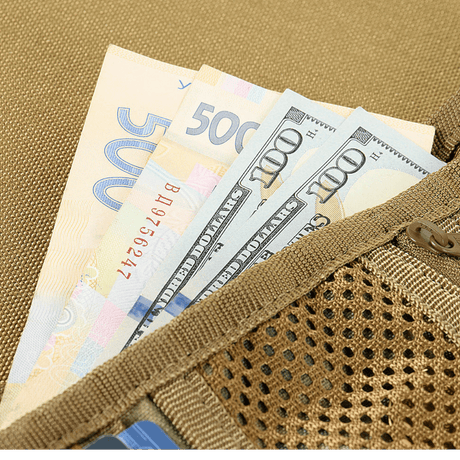 Close-up of M-Tac Patch Panel Elite Gen. II wallet with cash in a compartment.