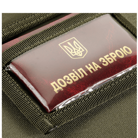 Close-up of M-Tac Patch Panel Elite Gen. II wallet showing robust material and a business card with Ukrainian text.