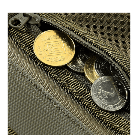M-Tac Patch Panel Elite Gen. II close-up of zip pocket with coins.
