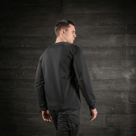 M-Tac Raglan Athlete sweatshirt from the back with minimalist design and raglan sleeves in black, seen on model.