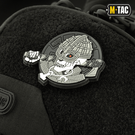 Close-up of M-Tac Buckler Bag Elite with tactical patch system and black design for secure equipment storage.