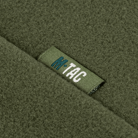 M-Tac Sweater Nord Fleece Polartec Dame i grønt med M-Tac logo, lavet af holdbart Polartec® 200 Series fleece for komfort og varme.