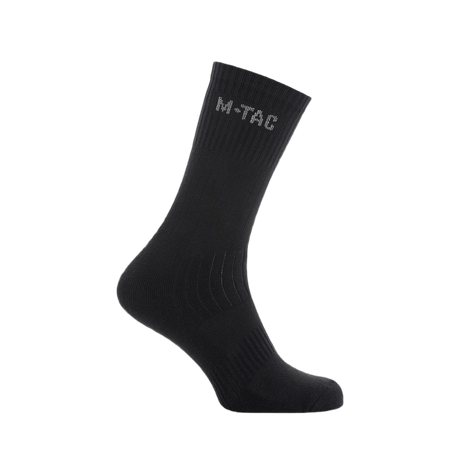M-Tac Sokker Mk.1 i sort, designet til komfort og støtte med ekstra polstring og svangstøtte til lange gåture og aktiviteter.