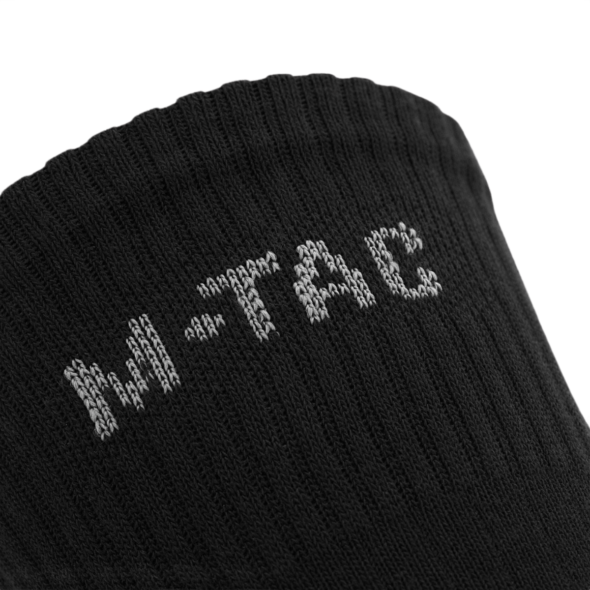 Nærbillede af M-Tac Sokker Mk.1, designet til komfort og støtte under lange gåture og aktiviteter.