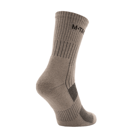 M-Tac Sokker Mk.1 i beige, designet til komfort og støtte med polstring og ventilationskanaler til lange vandreture.
