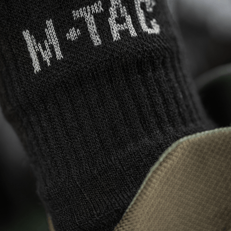 M-Tac Sokker Winter Wool i sort med elastisk kant for komfort og varme til vinterbrug.