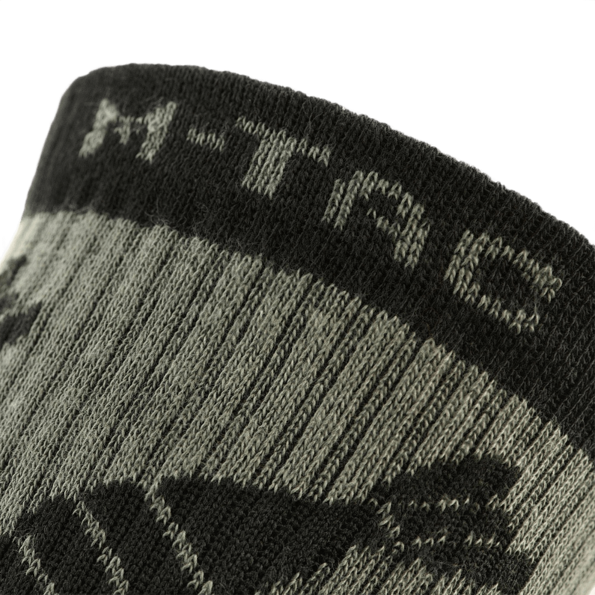 M-Tac Letvægtssokker Mk.3 Mortar Bombs i nærbillede, viser detaljerne i den lette, ergonomisk designede sok til trekking og daglig brug.