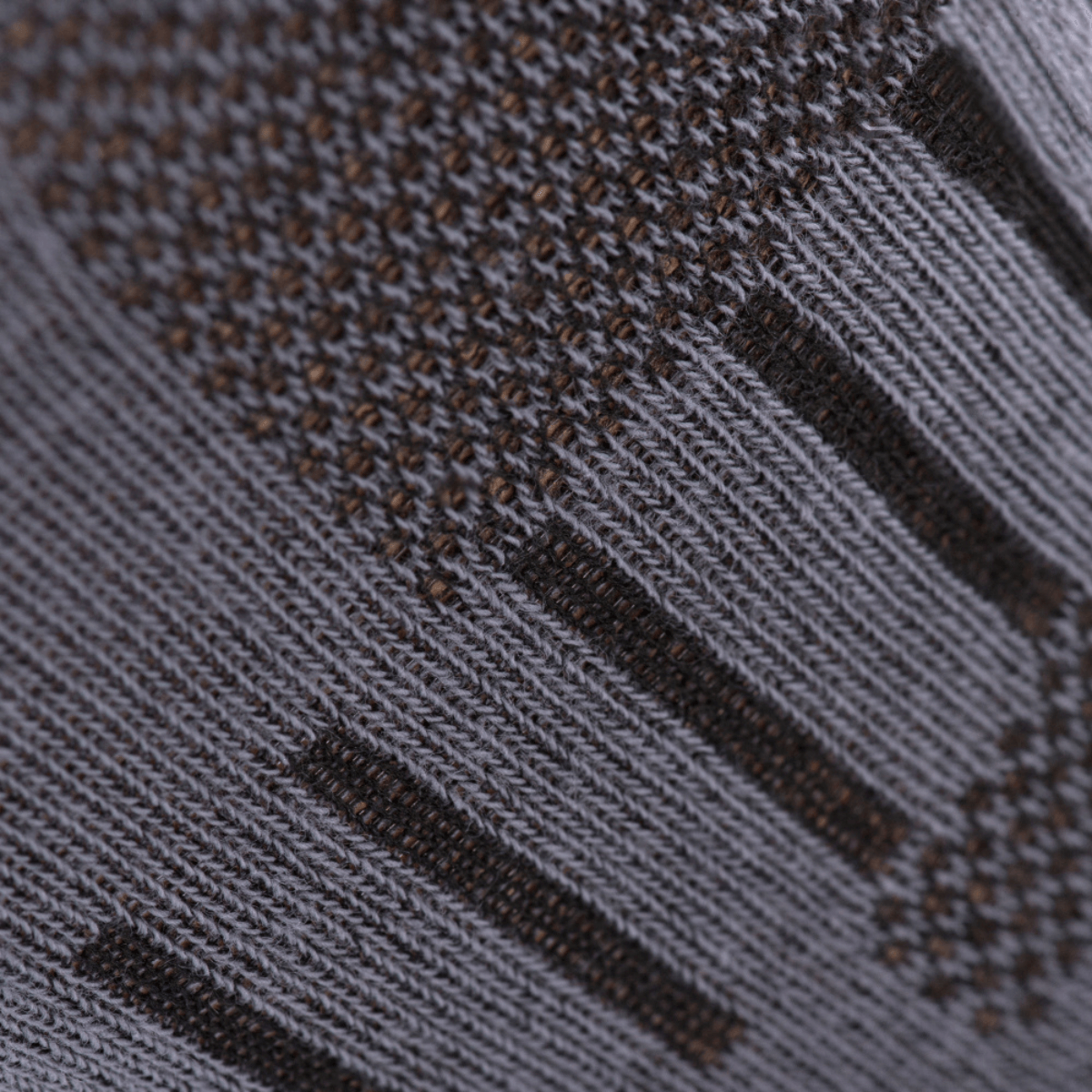 Nærbillede af åndbart materiale på M-Tac Let Sportsokker, designet til optimal komfort under løb og sport i varmt vejr.