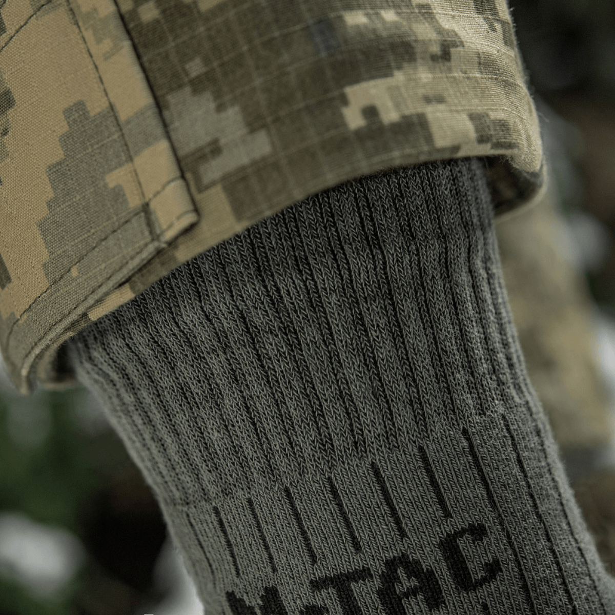 M-Tac Sokker Mid Calf Mk.4 til mænd, designet til komfort og beskyttelse under trekking, med polstrede thermozoner og elastisk kant.