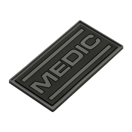 M-Tac Medic PVC 3D tactical patch with Velcro, black design and 3D effect. Dimensions: 70 x 35 mm. Perfect for uniforms and bags.