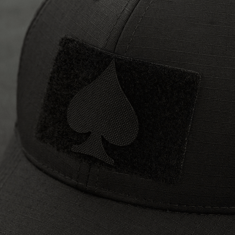 M-Tac Patch Spades Laser Cut attached to a black cap. Tactical patch with laser-cut "Ace of Spades" symbol, suitable for military use