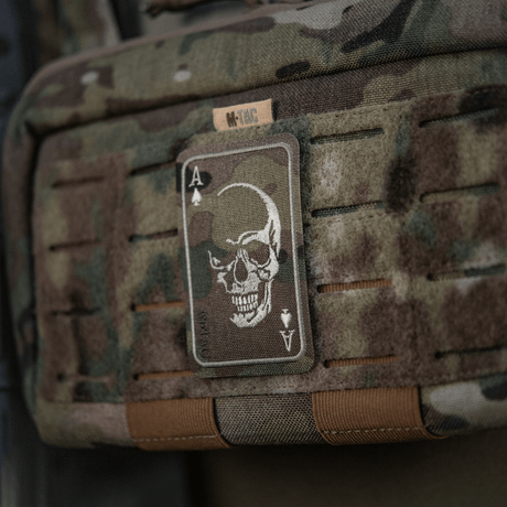M-Tac Patch Face of War (Embroidered) embroidered skull motif on Cordura 500D attached to camouflage gear with Velcro.
