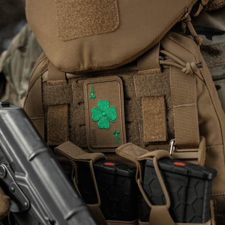 M-Tac Patch Lucky Card (Embroidered) with clover, mounted on tactical vest. Cordura 500D material, suitable for clothing and bags. Velcro attachment.