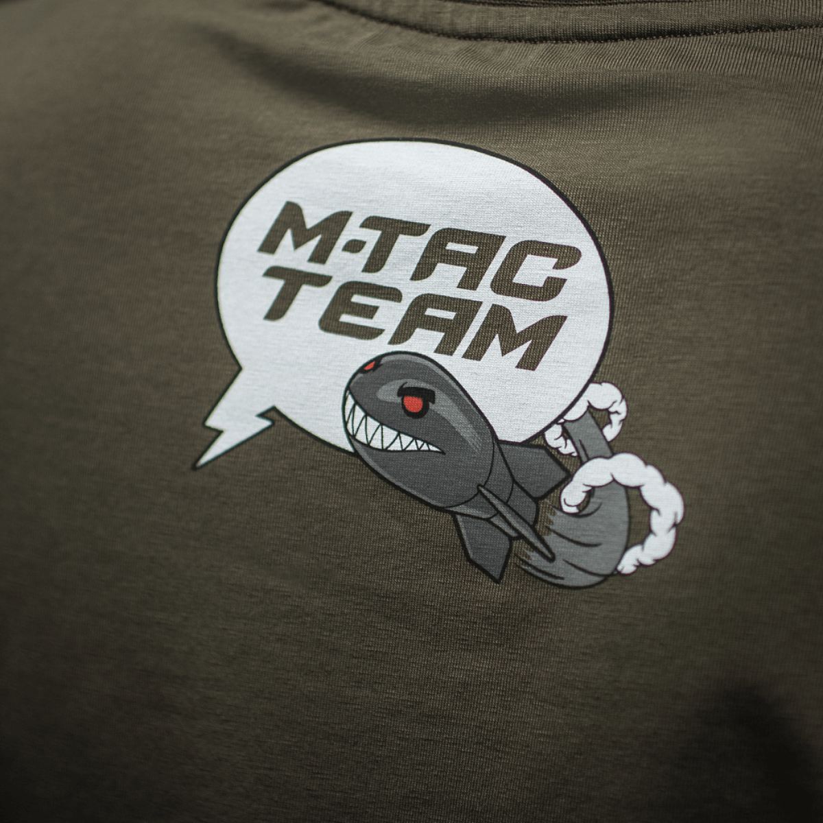 M-Tac T-Shirt Comics Drone Girl med tegneserietryk af drone med ondt smil og teksten 'M-TAC TEAM'. Hylder ukrainske droneoperatører.