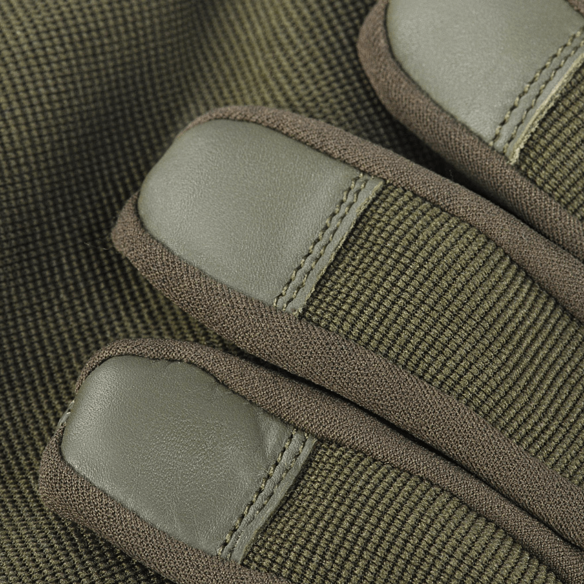 M-Tac Handsker Police i syntetiske materialer med læderdetaljer. Justerbare og komfortable for politi og sikkerhedsarbejde.