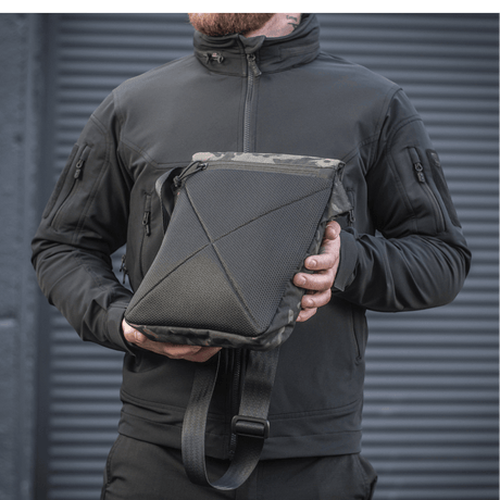 M-Tac Konvert Bag Elite with tablet-style design and adjustable shoulder strap in durable Cordura material.
