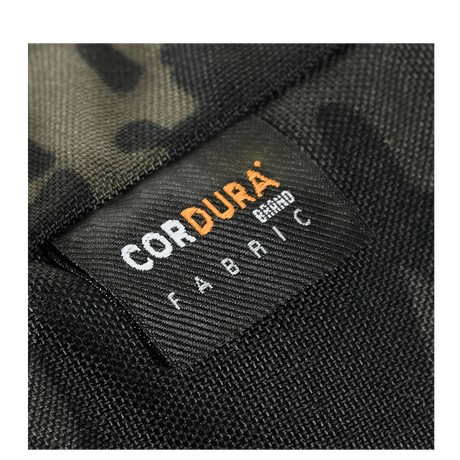 Close-up of M-Tac Konvert Bag Elite with Cordura 500D and Cordura Hex 1000D, showing the material label.