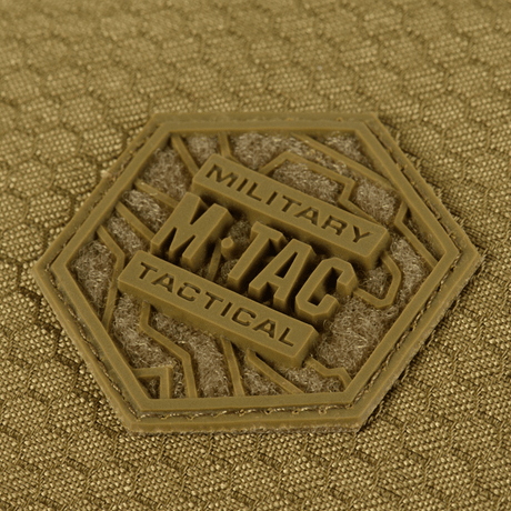 Close-up of M-Tac Konvert Taske Elite label in Cordura material, showing durable design and quality.